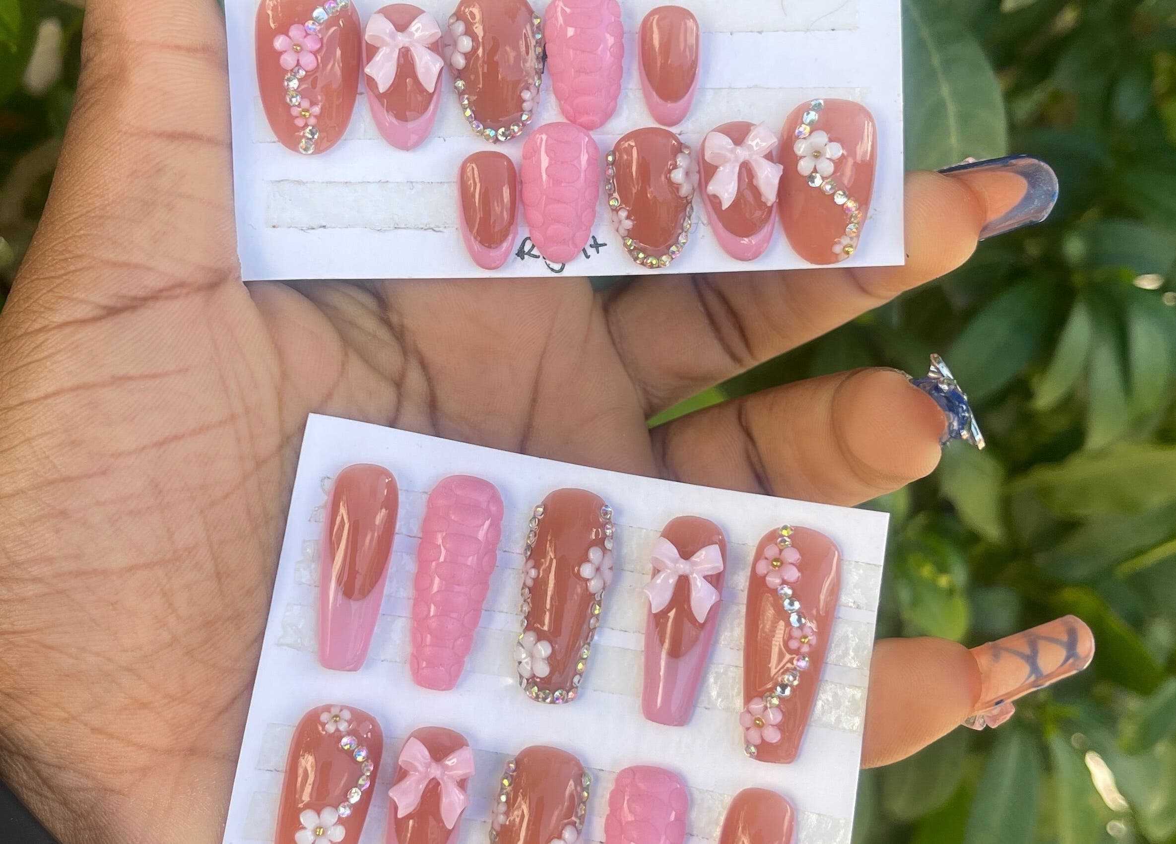 Elegant nail designs from Klawed.bymiah in Lowthers Hill, Christ Church, BB, featuring bows and embellishments.