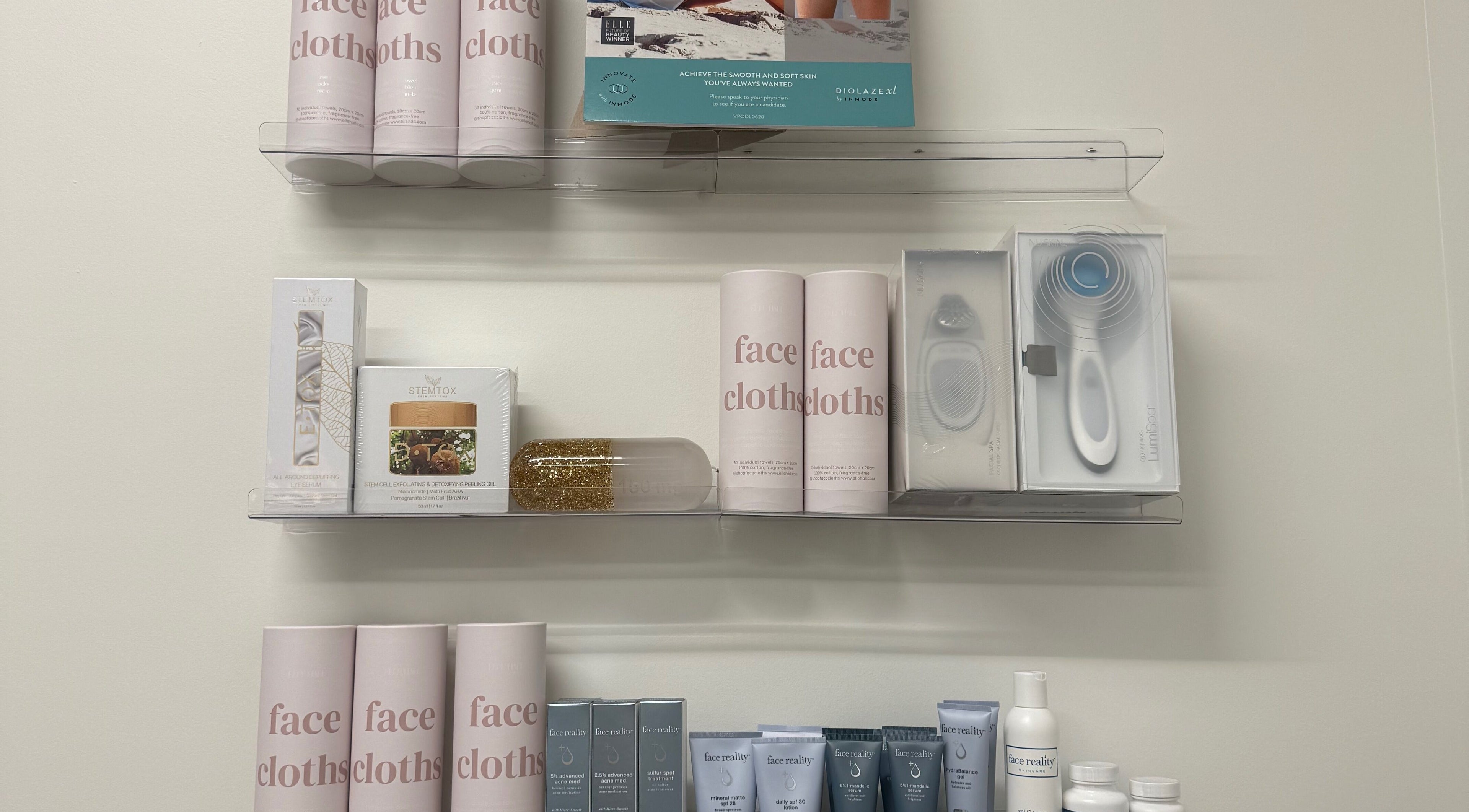 Beauty products display at L’esthetique de Sofi, Coral Gables, Florida, US showcasing face cloths and skincare.