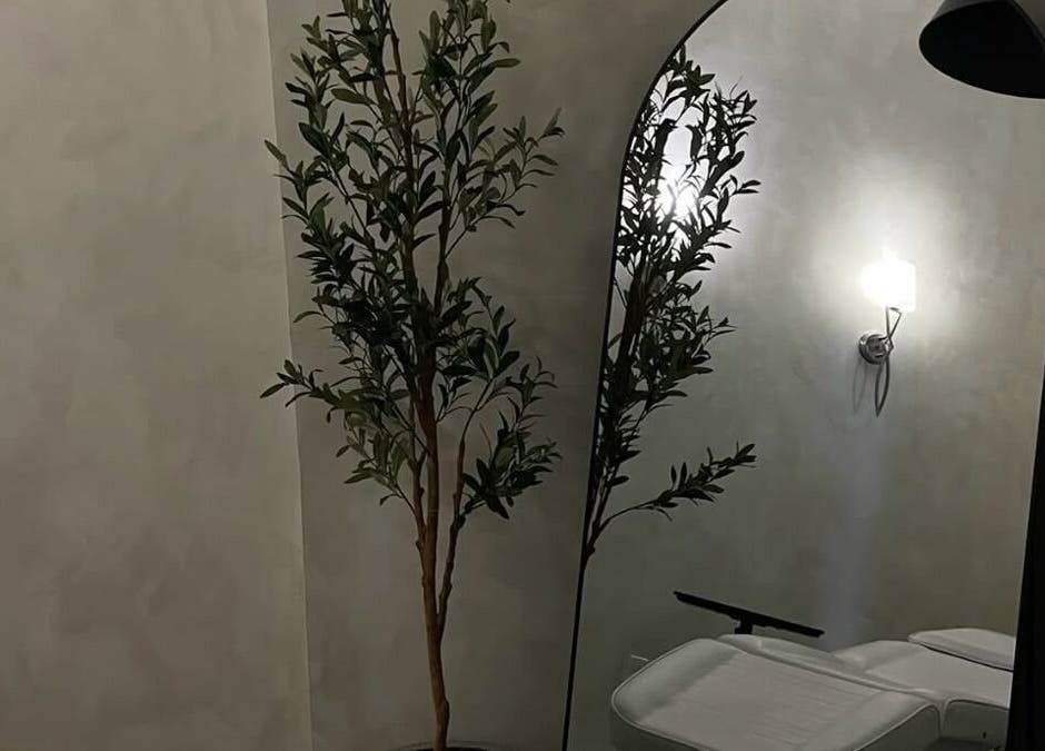 Relaxing treatment room at The Mane Place in St. Petersburg, Florida, US with elegant decor and calming ambiance.