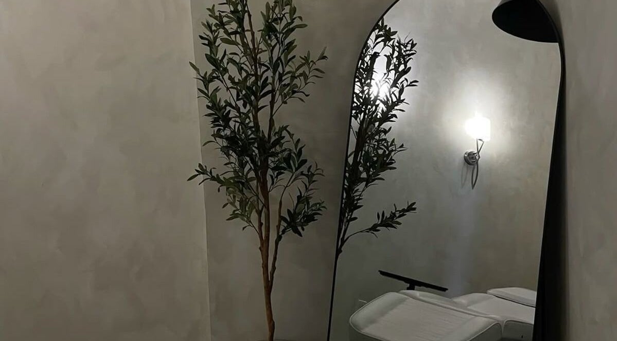 Relaxing treatment room at The Mane Place in St. Petersburg, Florida, US with elegant decor and calming ambiance.