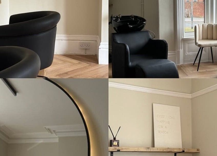 Elegant interior of The Mane Place, St. Petersburg, Florida, US, showcasing modern salon chairs and decor.