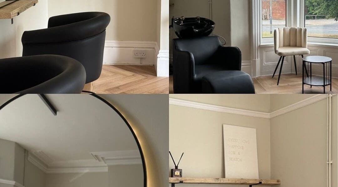 Elegant interior of The Mane Place, St. Petersburg, Florida, US, showcasing modern salon chairs and decor.