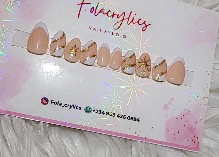 Elegant nail art set with gold accents from Folacrylics, Lagos, Lagos, NG.