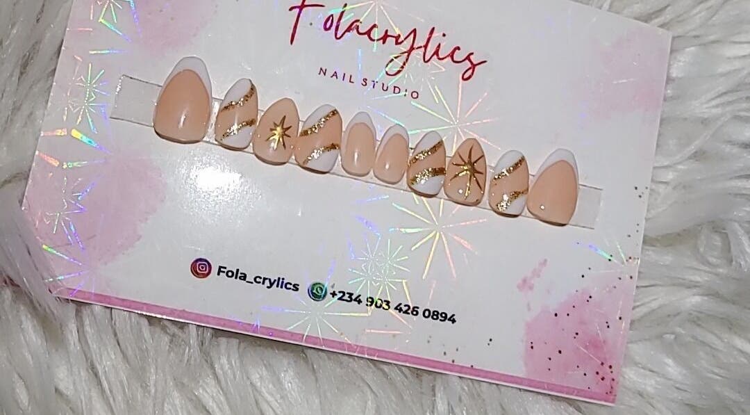 Elegant nail art set with gold accents from Folacrylics, Lagos, Lagos, NG.