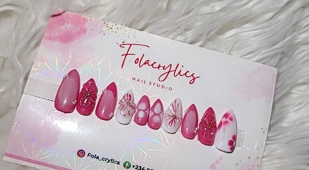 Dazzling nail art designs at Folacrylics, Lagos, Lagos, NG, displayed on a textured backdrop.