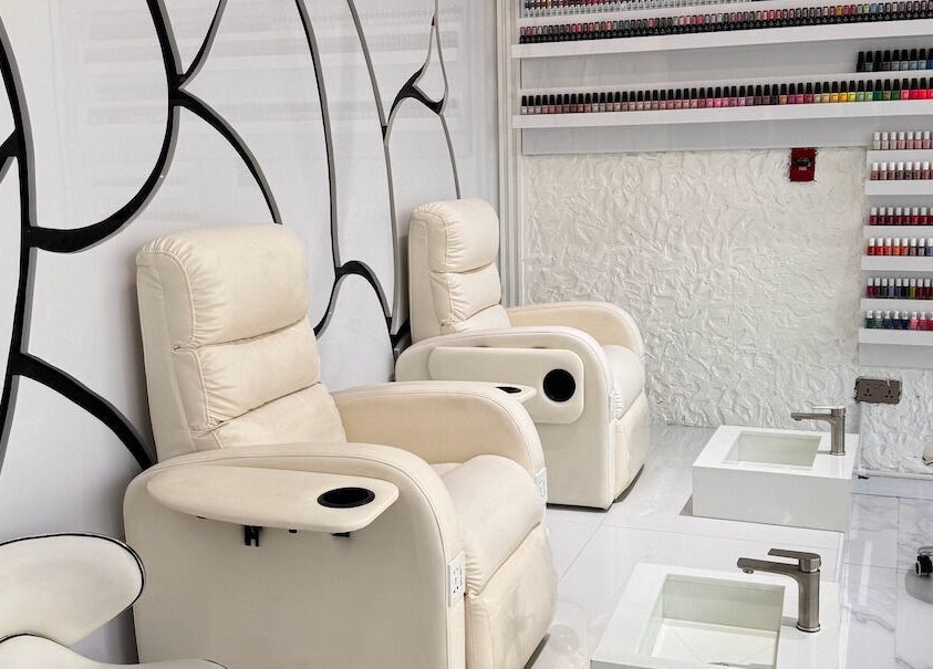 Luxurious nail spa chairs and polish display at Lul Beauty Salon, Dubai, Dubai, AE.