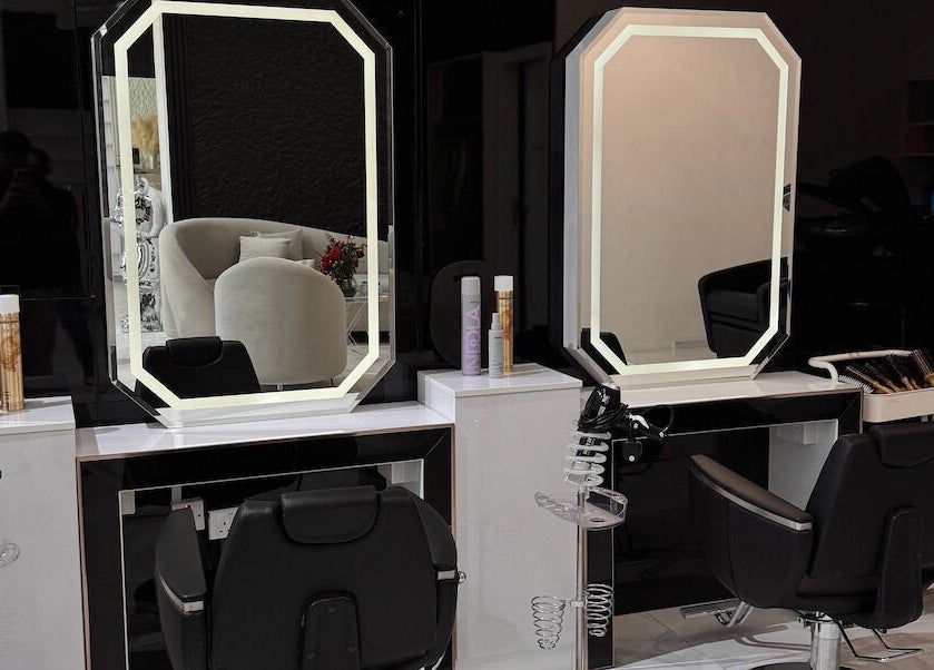Elegant salon mirrors and styling chairs at Lul Beauty Salon, Dubai, Dubai, AE, offering luxury hair services.