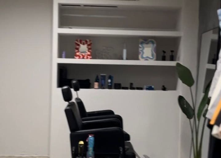 Modern salon interior at ORBIT CREW, San Nicolás De Los Arroyos, Provincia De Buenos Aires, AR showcases stylish decor.