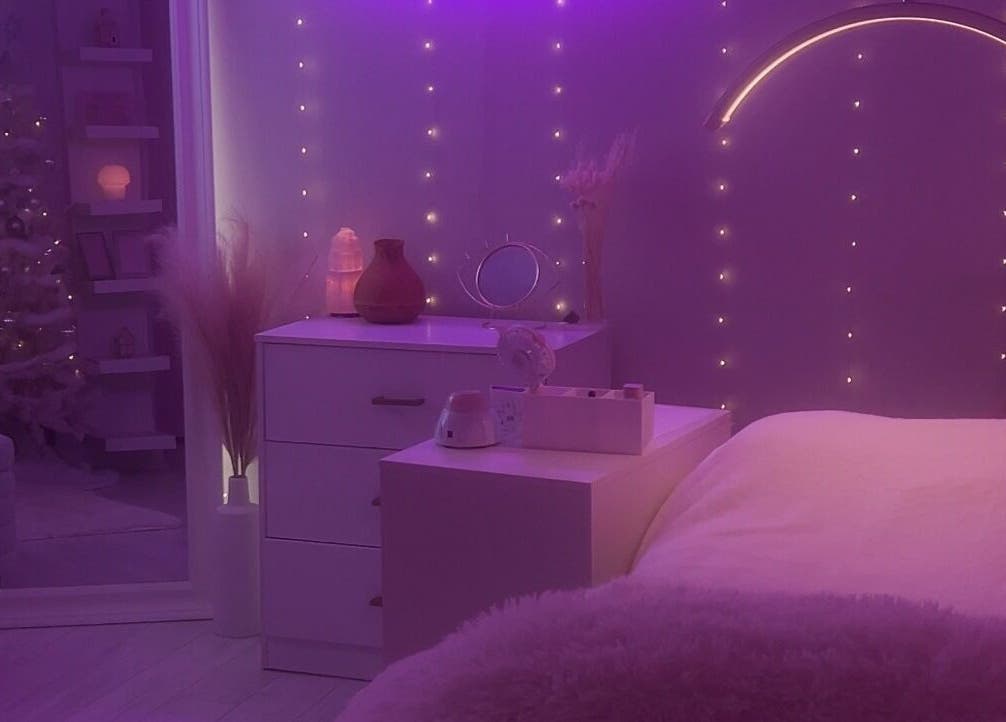 Cozy treatment room with purple lights at Carlene’s Lashes in Courtice, Ontario, CA.