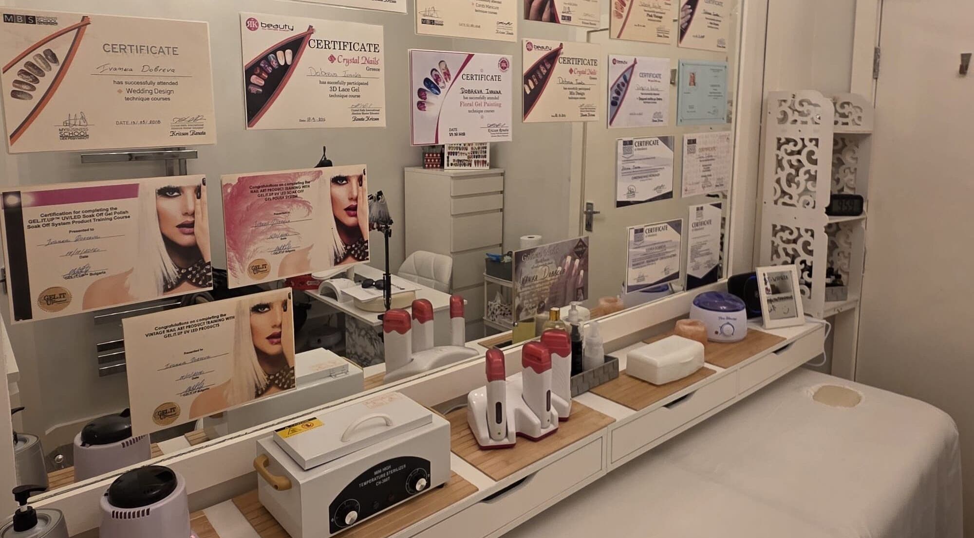 Professional awards display at V Beauty World Ltd, Warrington, England, GB, showcasing various certificates.