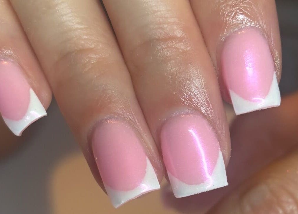 Elegant pink and white French manicure by biabsbymil in GB salon.