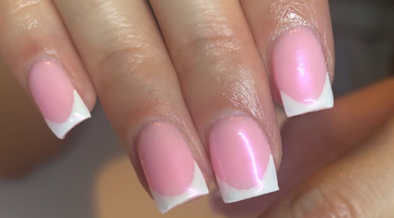 Elegant pink and white French manicure by biabsbymil in GB salon.