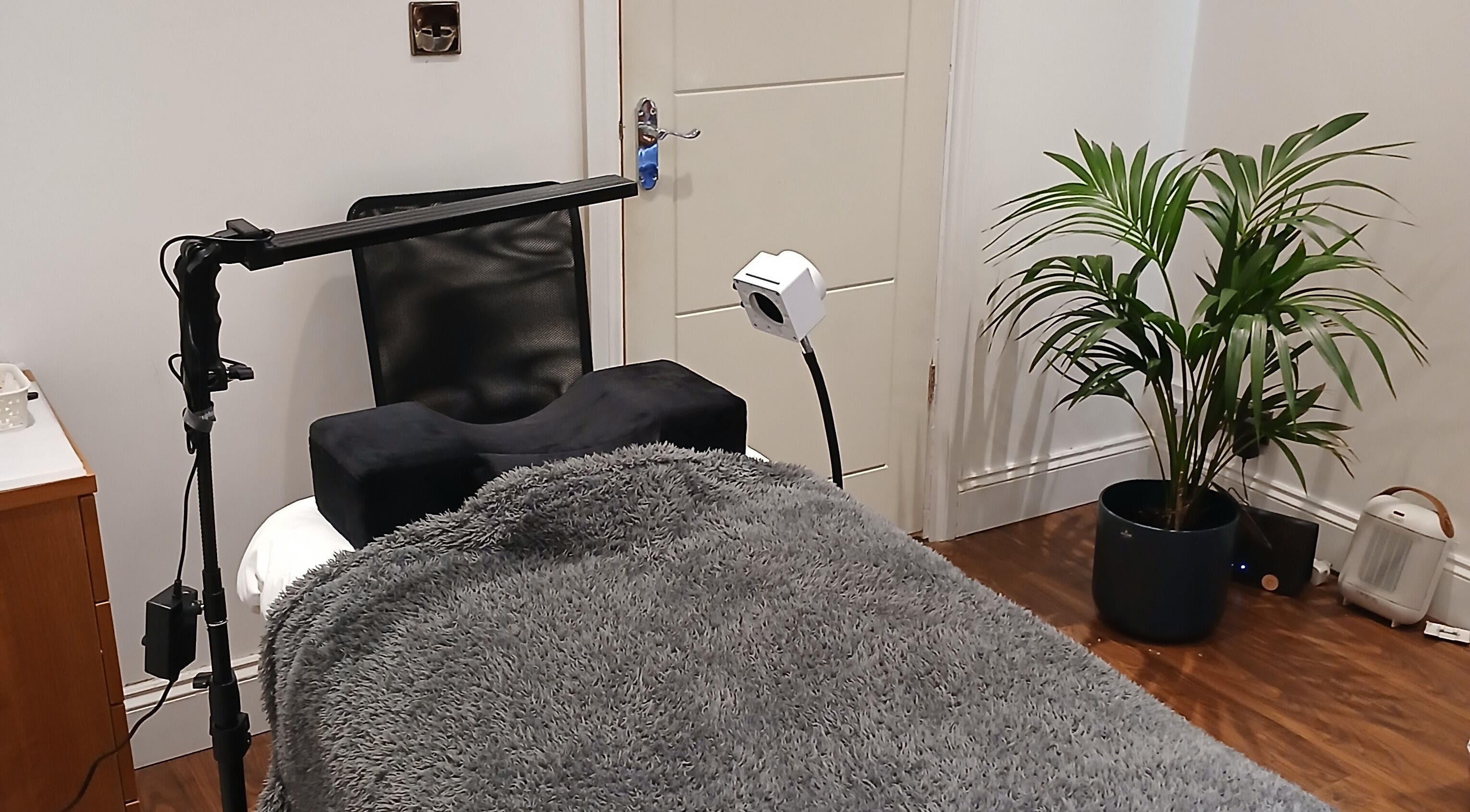 Cozy treatment room at Lashes by Karina East Preston, featuring a plush bed and elegant decor in East Preston, England, GB.