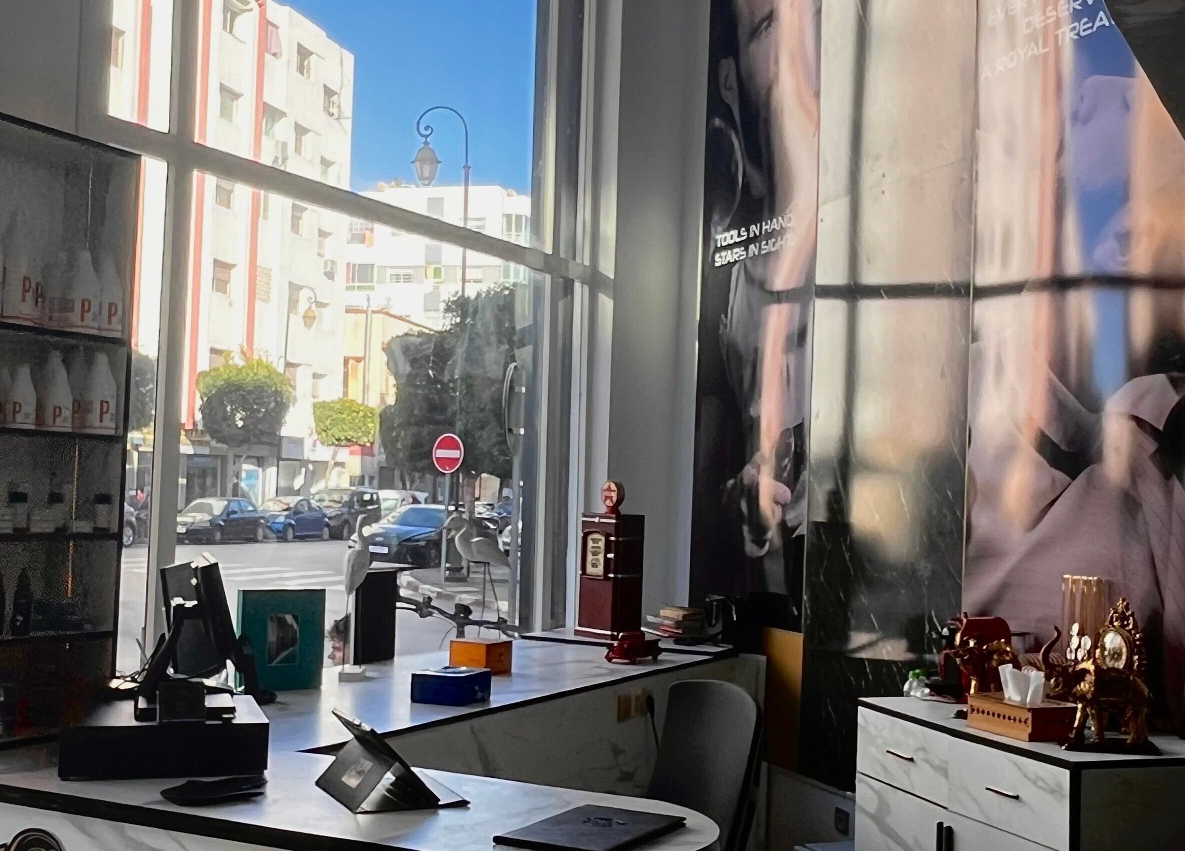 Inside look at Barber's Star showcasing stylish decor and street view in Rabat, Rabat-salé-kénitra, MA.