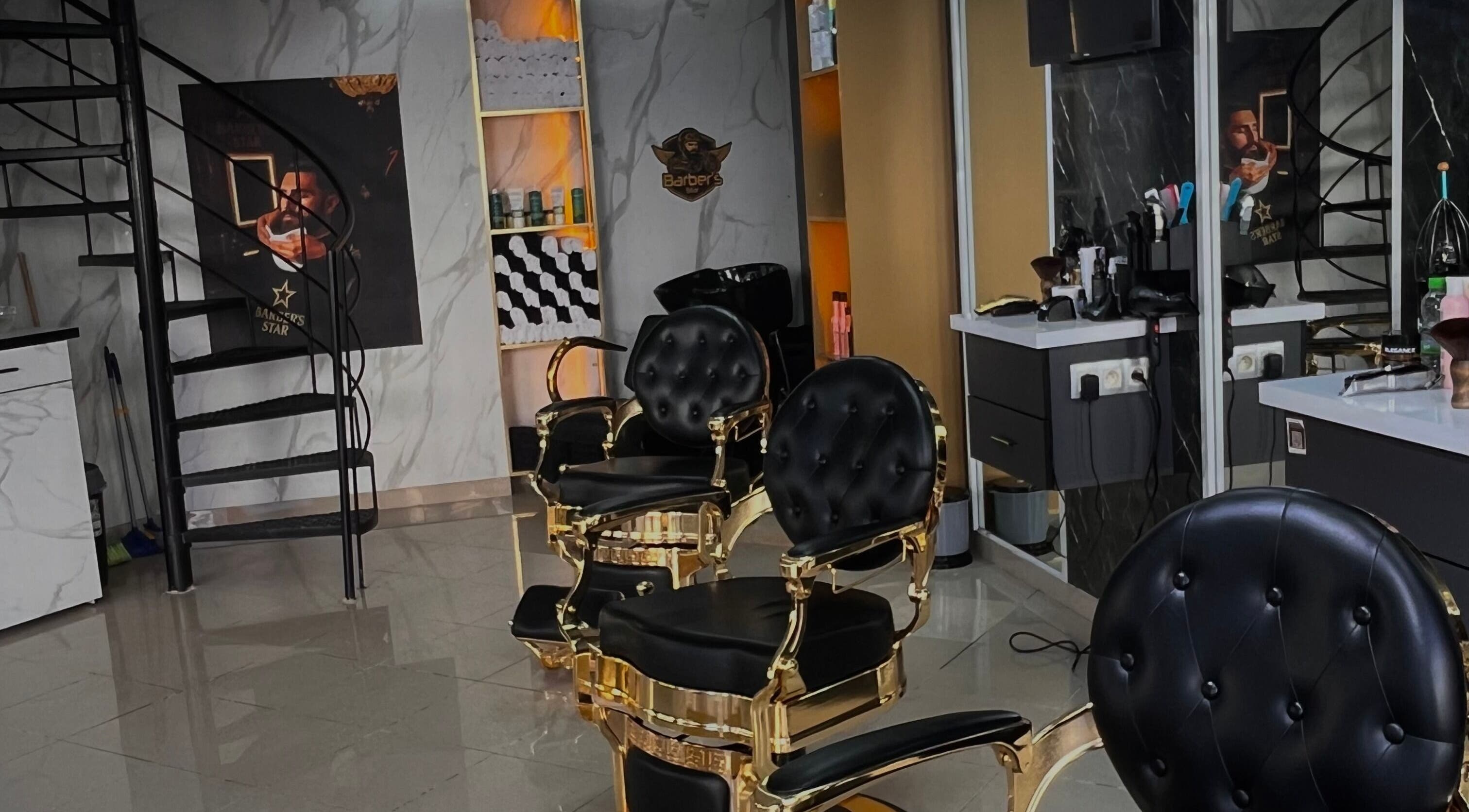 Luxurious barber chairs at Barber's Star in Rabat, Rabat-salé-kénitra, MA featuring chic interiors.