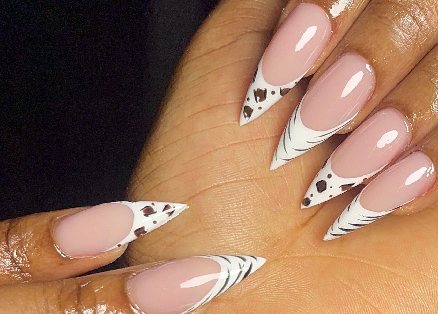 Elegant nail art at DEAREST BEAUTY STUDIO in Lagos, Lagos, NG showcasing intricate design.