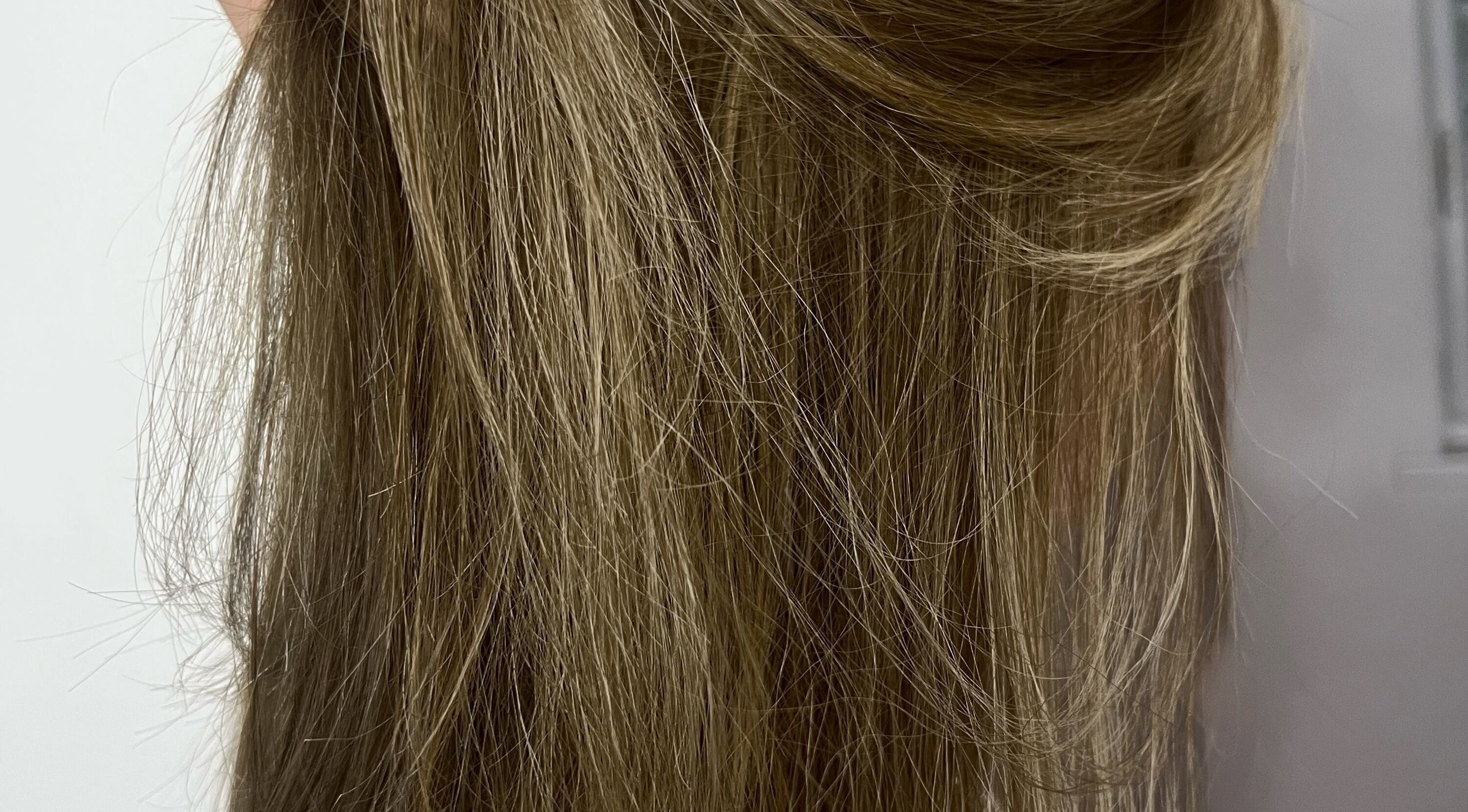 Smooth, styled hair at Hair by Charl, Birmingham, England, GB showcasing expert hairdressing.