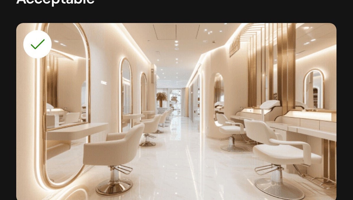 Elegant beauty salon interior at OWT Limited studios, Ibadan, Oyo, NG with chic white decor and modern chairs.