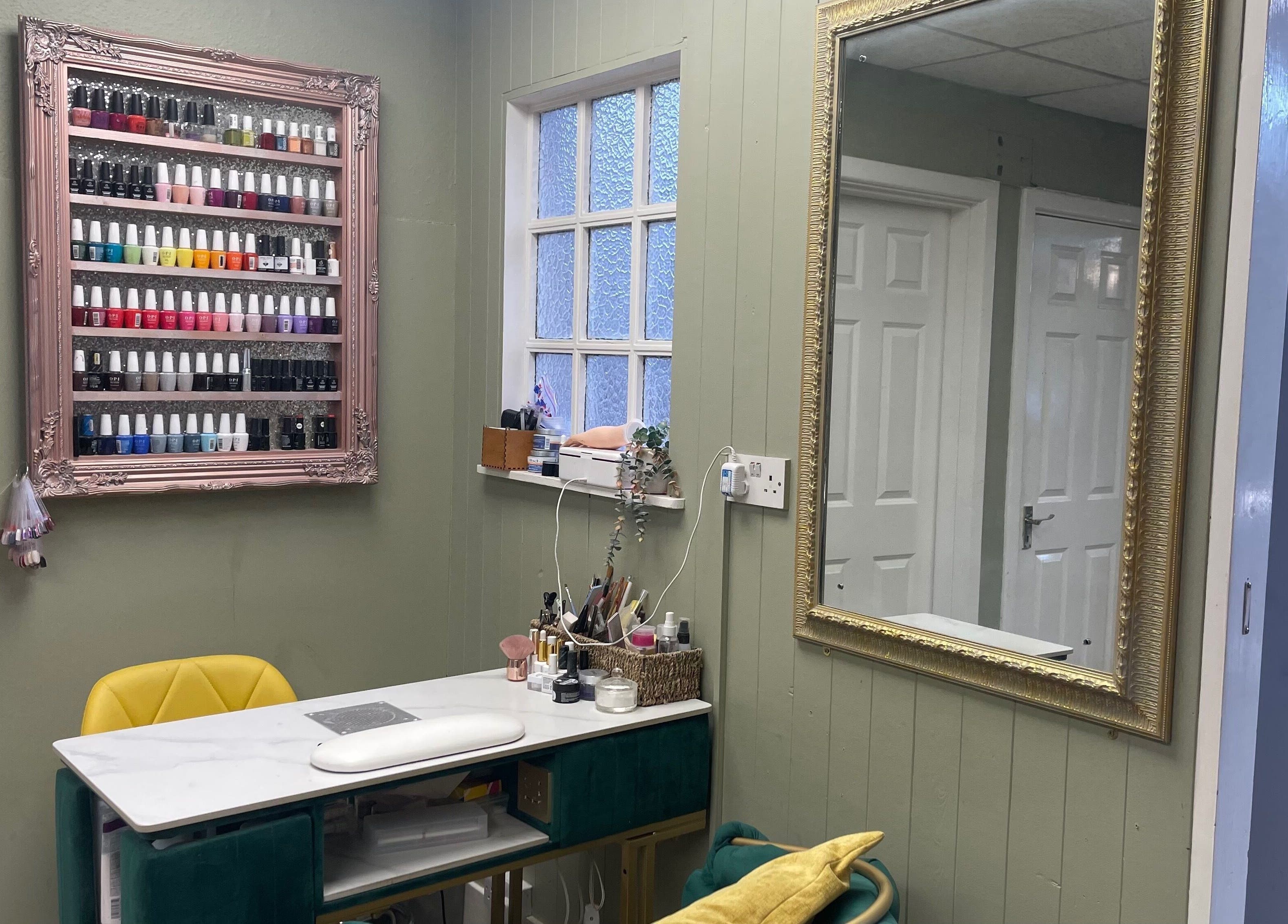 Nail polish display and styling area at Salon K, Cambridge, England, GB offering beauty services.