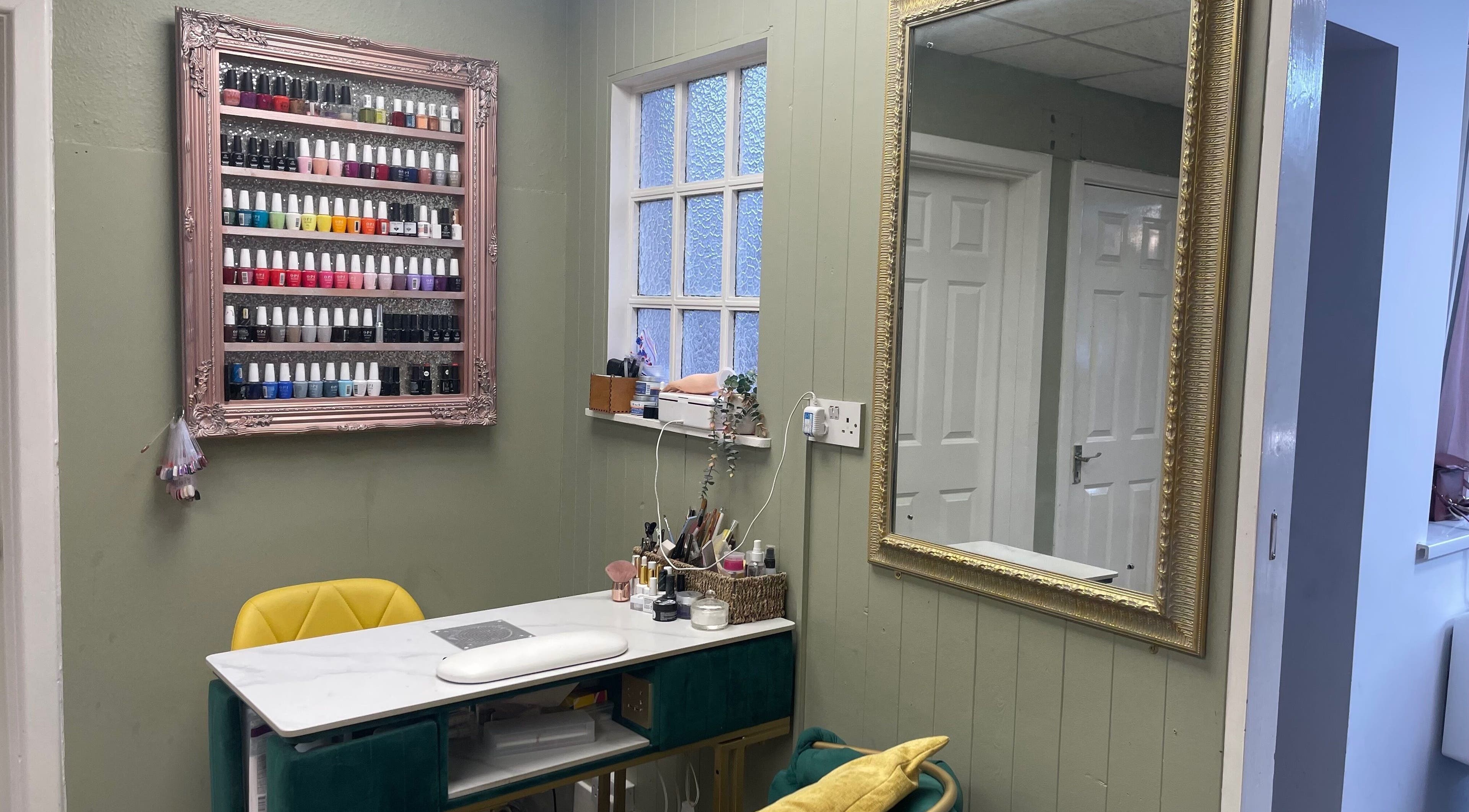 Nail polish display and styling area at Salon K, Cambridge, England, GB offering beauty services.
