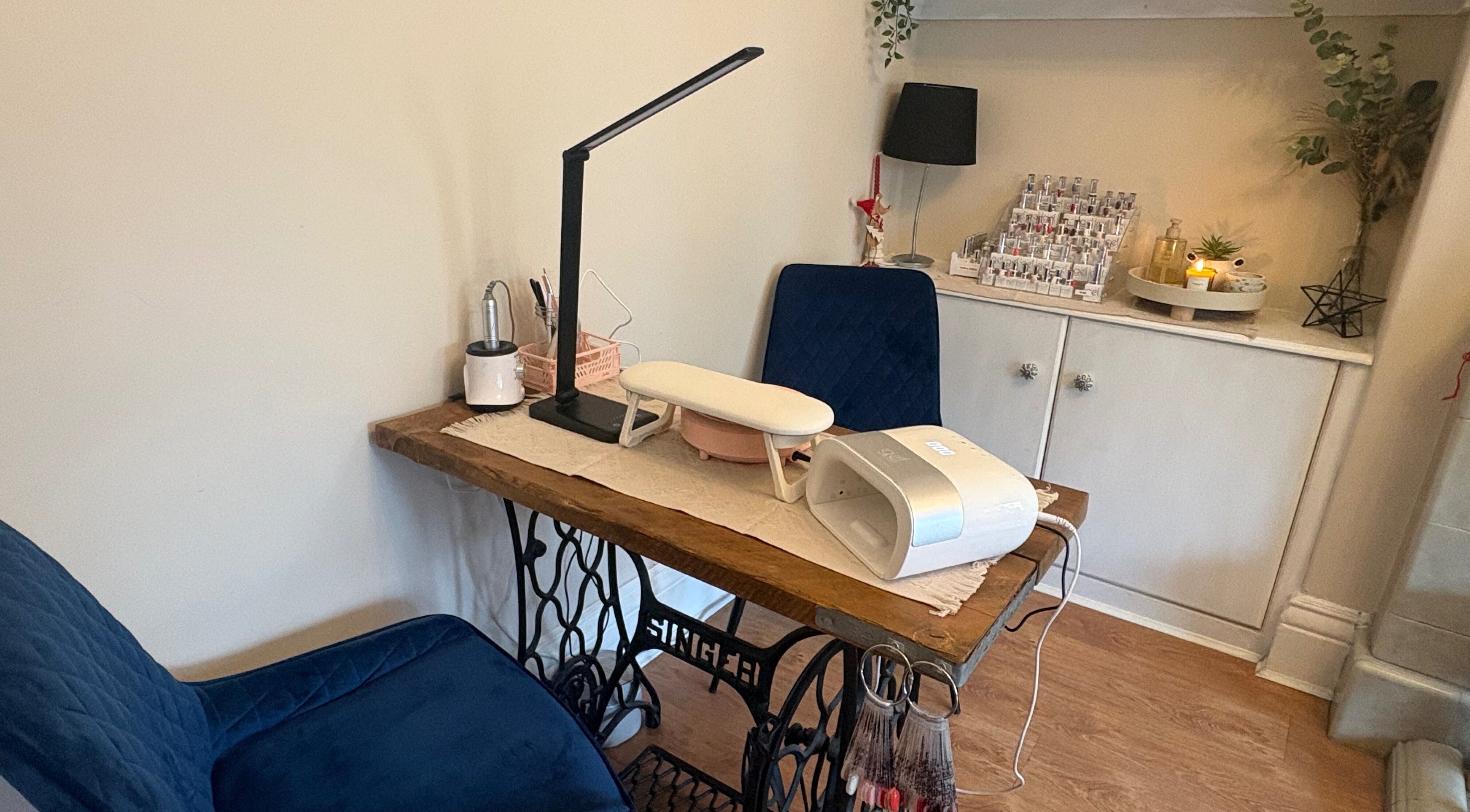 Cozy nail station at Nails by Dena in Blackpool, England, GB featuring tools and polish display.