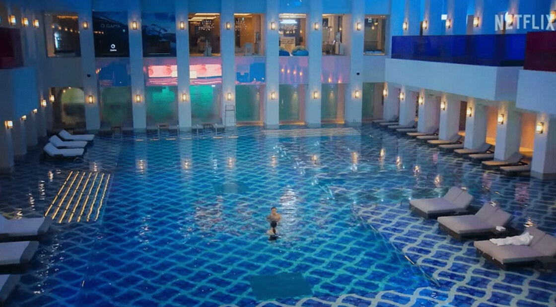 Elegant indoor pool setting at Cuts with Ro, New York, New York, US, reflecting serene relaxation.