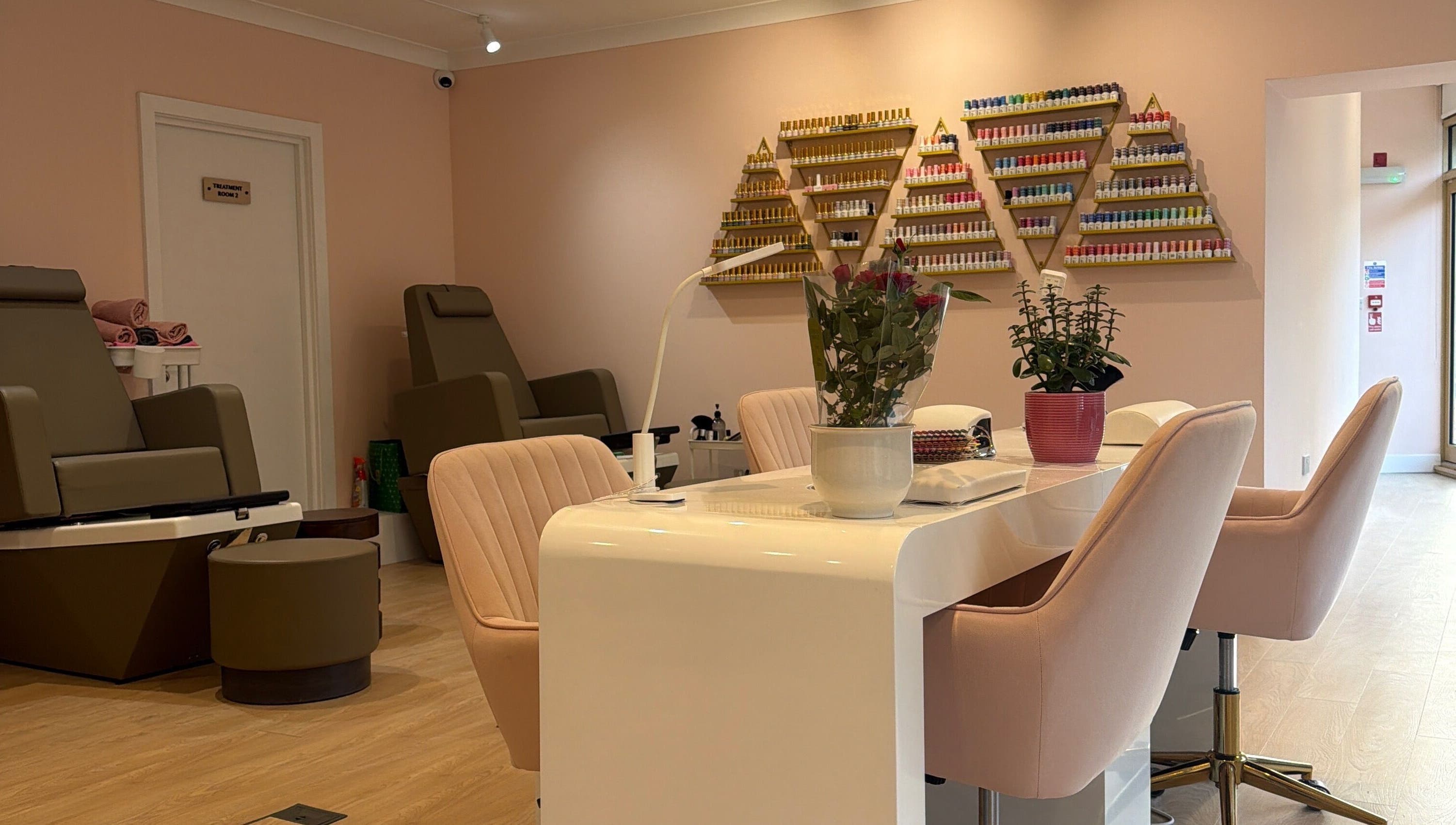 Elegant spa interior at Hampstead Medspa, London, England, GB, featuring plush chairs and stylish decor.