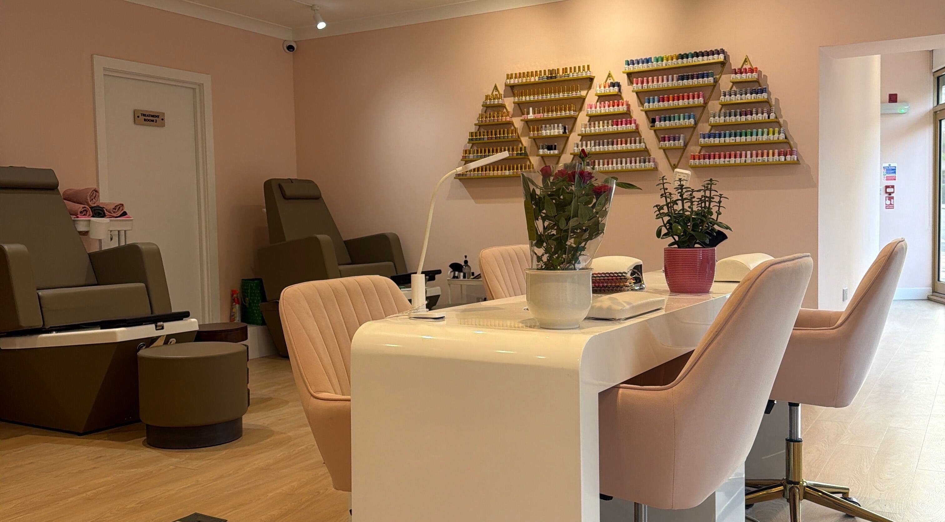 Elegant spa interior at Hampstead Medspa, London, England, GB, featuring plush chairs and stylish decor.