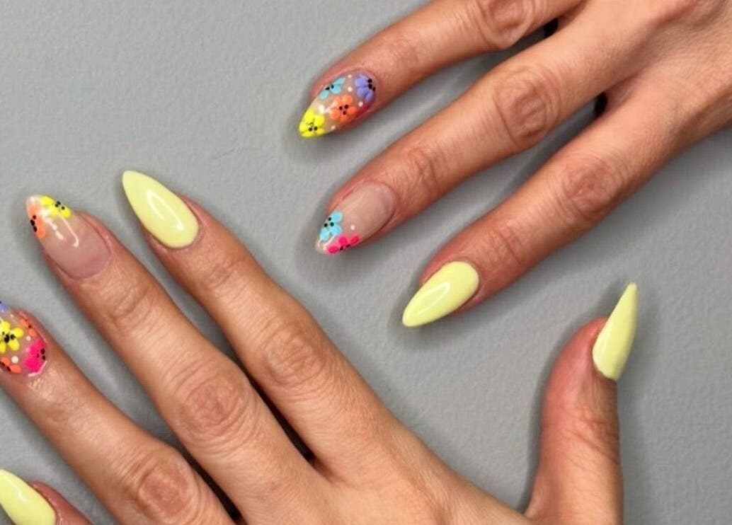 Vibrant floral nail art at Hampstead Medspa, London, England, GB highlighting colorful and creative designs.