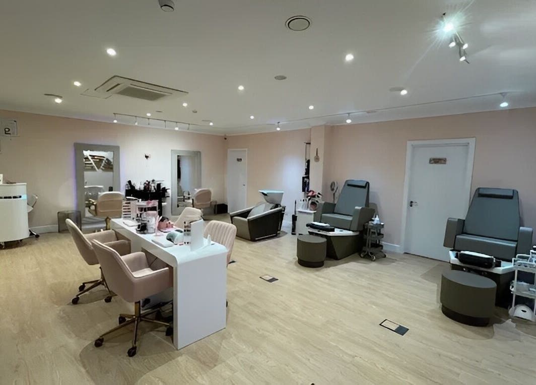 Relaxing interior of Hampstead Medspa in London, England, GB featuring plush chairs and modern decor.
