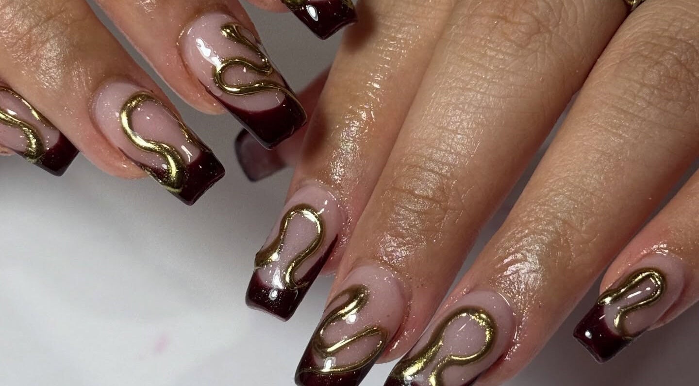 Elegant nail art with gold swirls at QYN Beauty Lab, Melbourne, Victoria, AU.