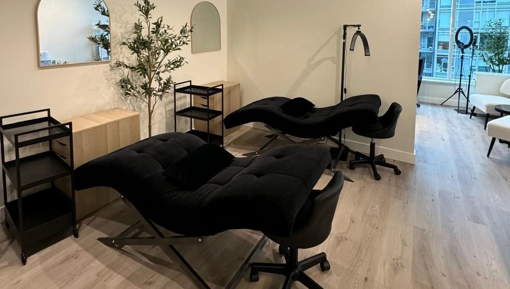Stylish lash extension chairs at LASHBYRACHEL, Burnaby, British Columbia, CA, offering a serene beauty experience.