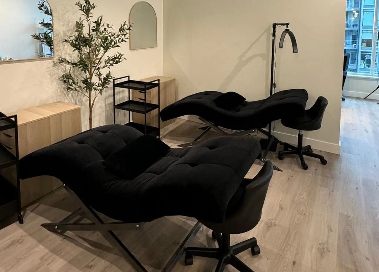 Stylish lash extension chairs at LASHBYRACHEL, Burnaby, British Columbia, CA, offering a serene beauty experience.