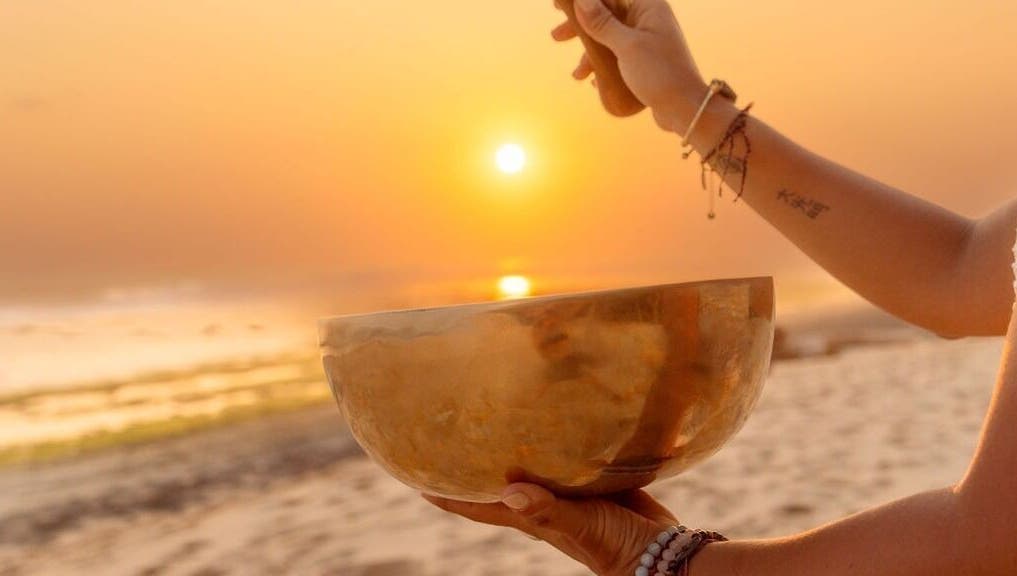 Serene sunset meditation with singing bowl at Languages of You, Bali, Bali, ID.