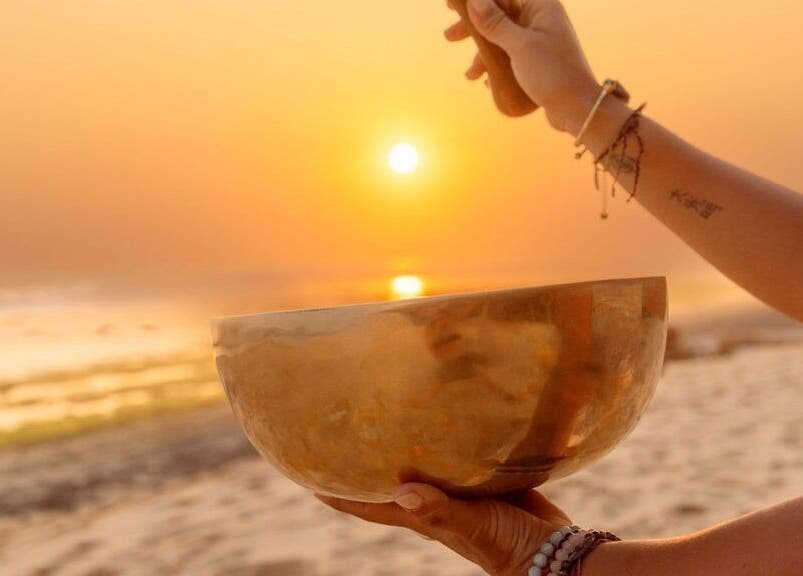 Serene sunset meditation with singing bowl at Languages of You, Bali, Bali, ID.