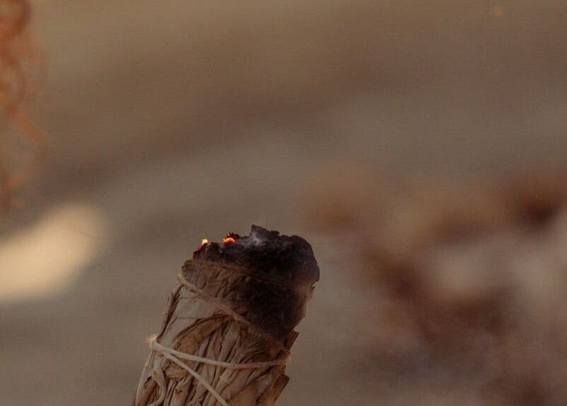 Burning sage at Languages of You in Bali, Bali, ID, creating a calming, spiritual ambiance.