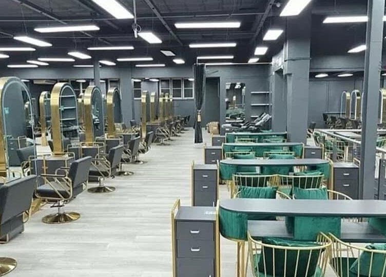 Luxurious interior of Pretoria Dreadlocks in Pretoria, Gauteng, ZA, featuring chic salon stations with gold accents.