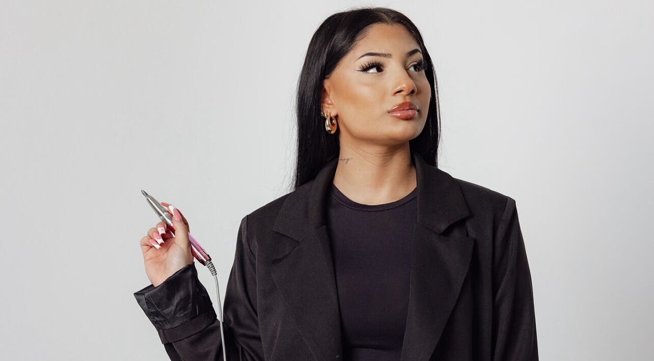 Professional nail artist at Nail Haven By Chloe, Melbourne, Victoria, AU with nail tool.