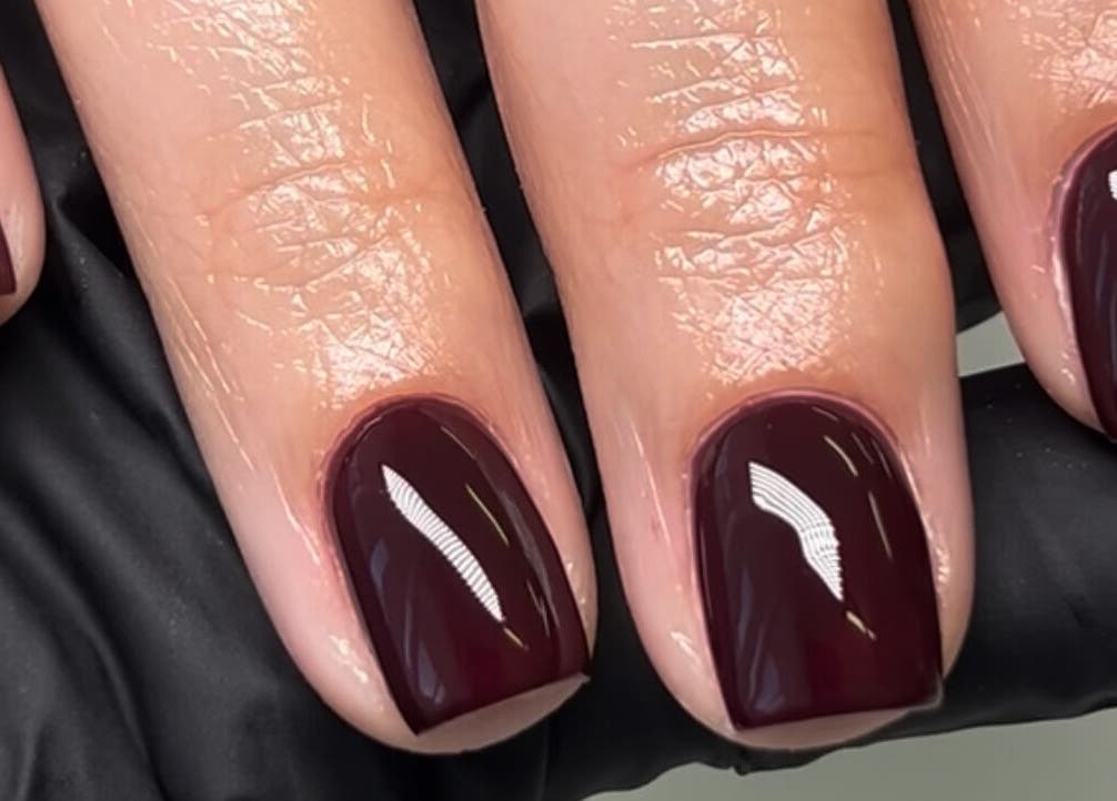 Elegant glossy plum nails at Nail Haven By Chloe, Melbourne, Victoria, AU.