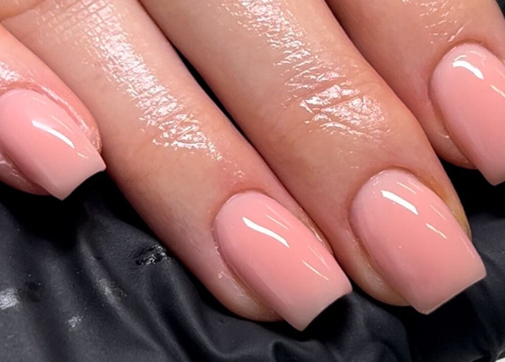 Elegant pink manicure at Nail Haven By Chloe in Melbourne, Victoria, AU. Perfectly polished nails shine with gloss.