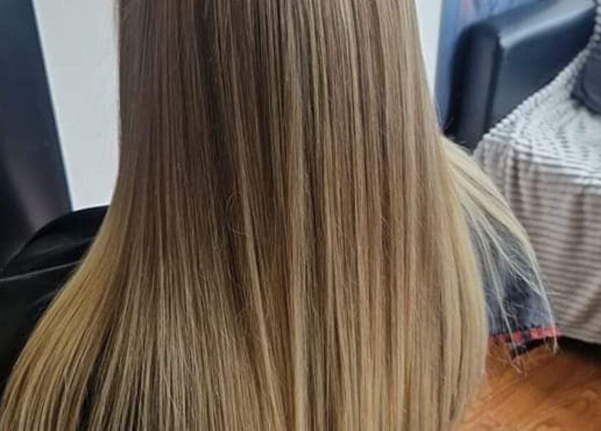 Smooth, sleek blonde hairstyle at KF Hair Beauty Lifestyle, Fleetwood, England, GB.