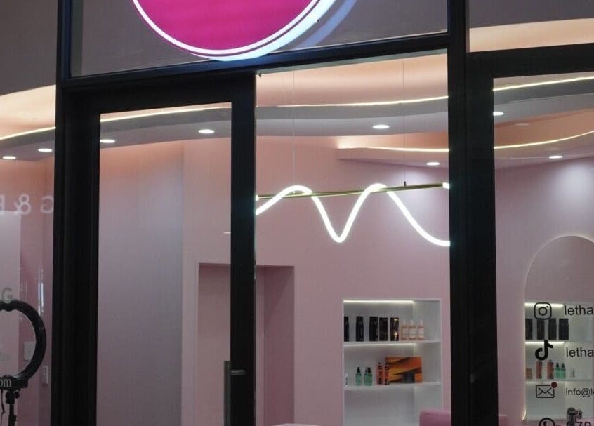 Front view of Lethal Beauty in Midrand, Gauteng, ZA, showcasing modern pink interior and sleek design.