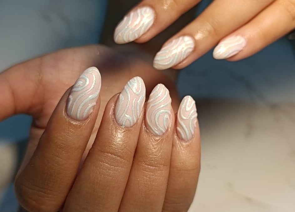 Intricate swirl nail art at Petite Artistic Touch in Wanica, Wanica, SR showcases elegance and artistry.
