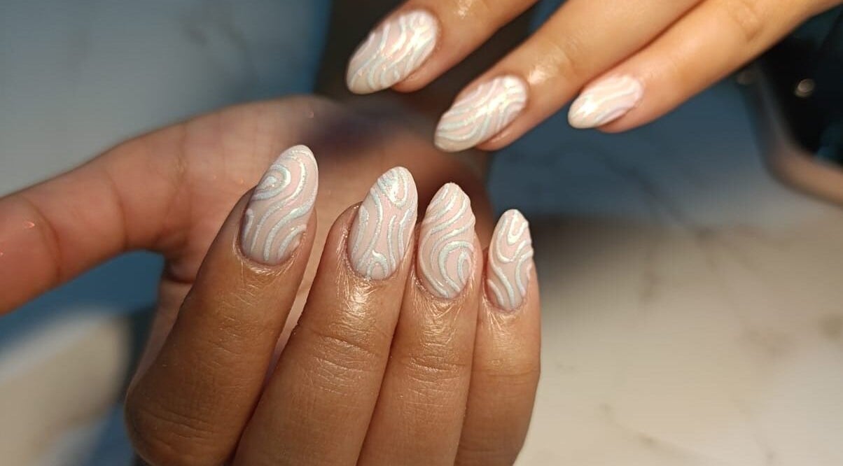 Intricate swirl nail art at Petite Artistic Touch in Wanica, Wanica, SR showcases elegance and artistry.