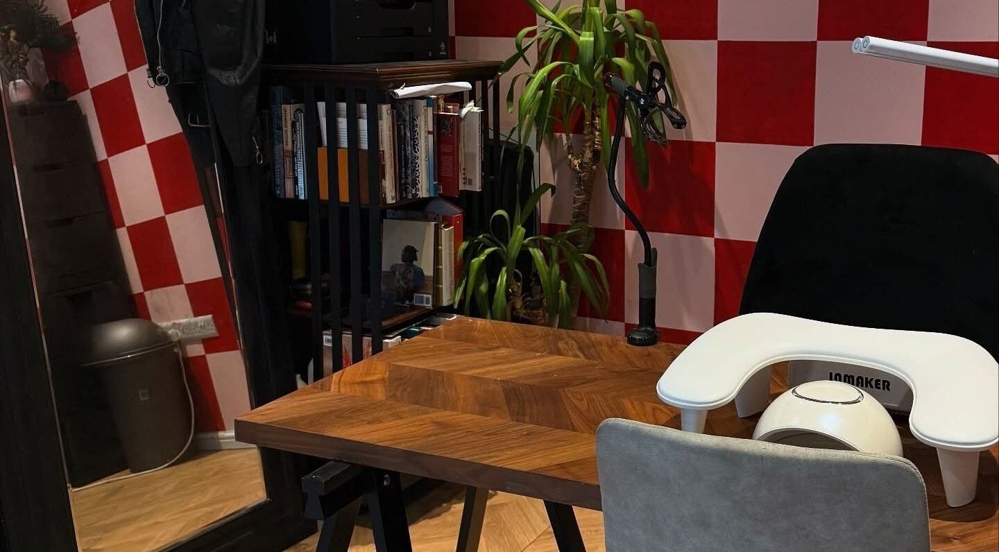 Inviting nail care desk at Laurs Claws, Bedford, England, GB, featuring stylish decor and comfortable seating.