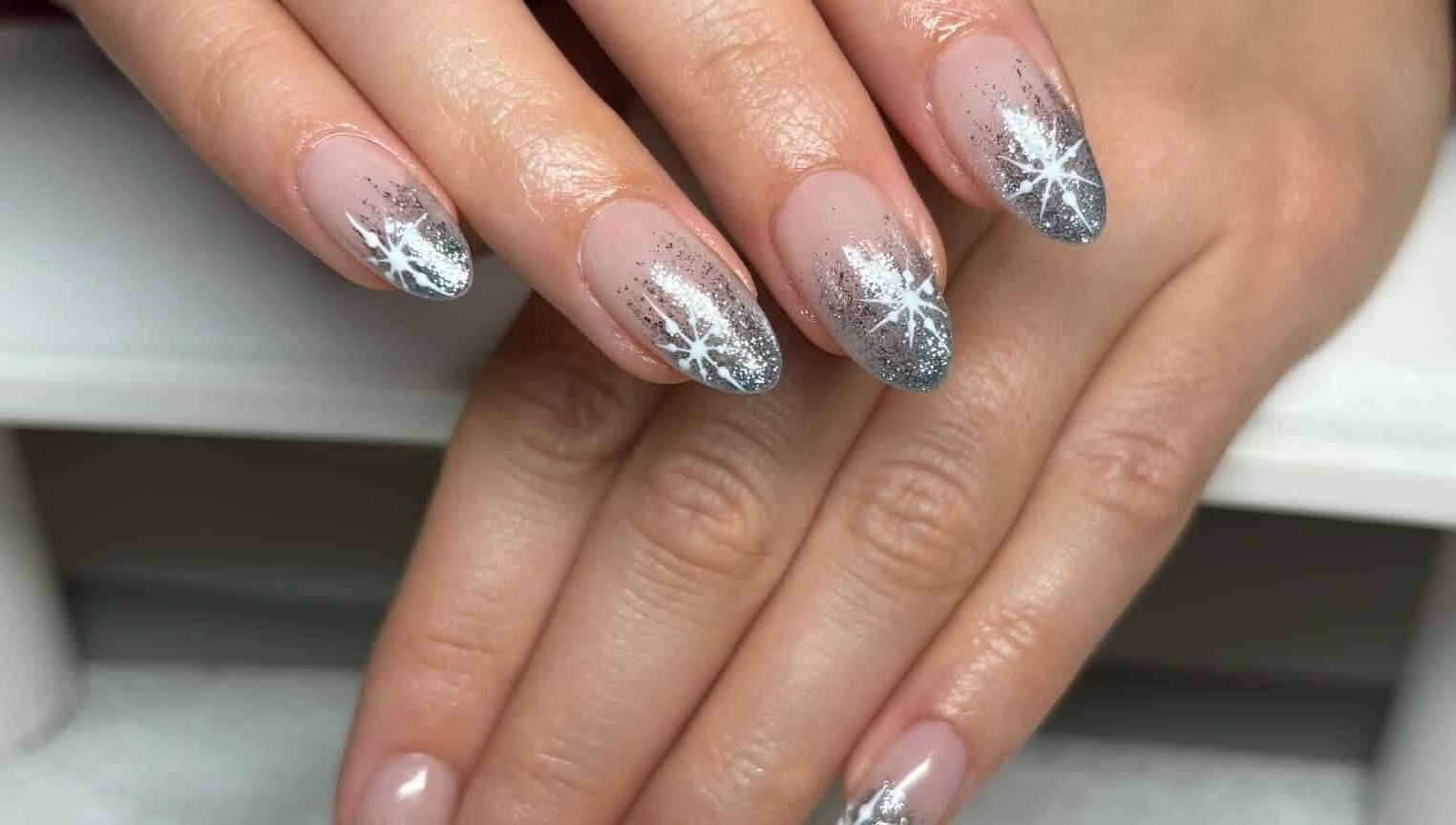 Elegant star-patterned nails at Carli Esthetics, Cornwall, Ontario, CA. Perfect for a stylish manicure look.