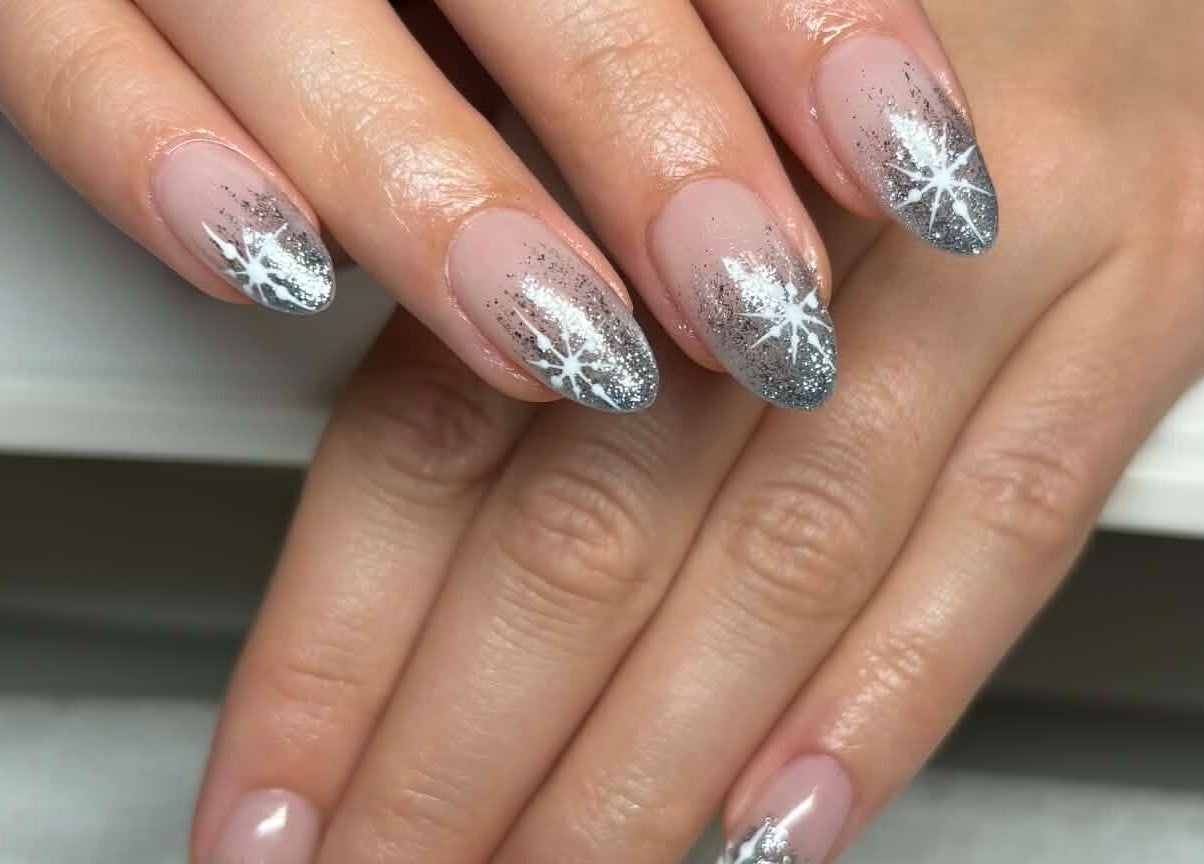 Elegant star-patterned nails at Carli Esthetics, Cornwall, Ontario, CA. Perfect for a stylish manicure look.