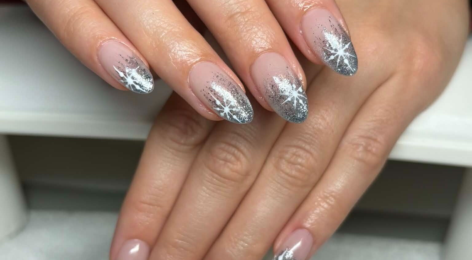Elegant star-patterned nails at Carli Esthetics, Cornwall, Ontario, CA. Perfect for a stylish manicure look.