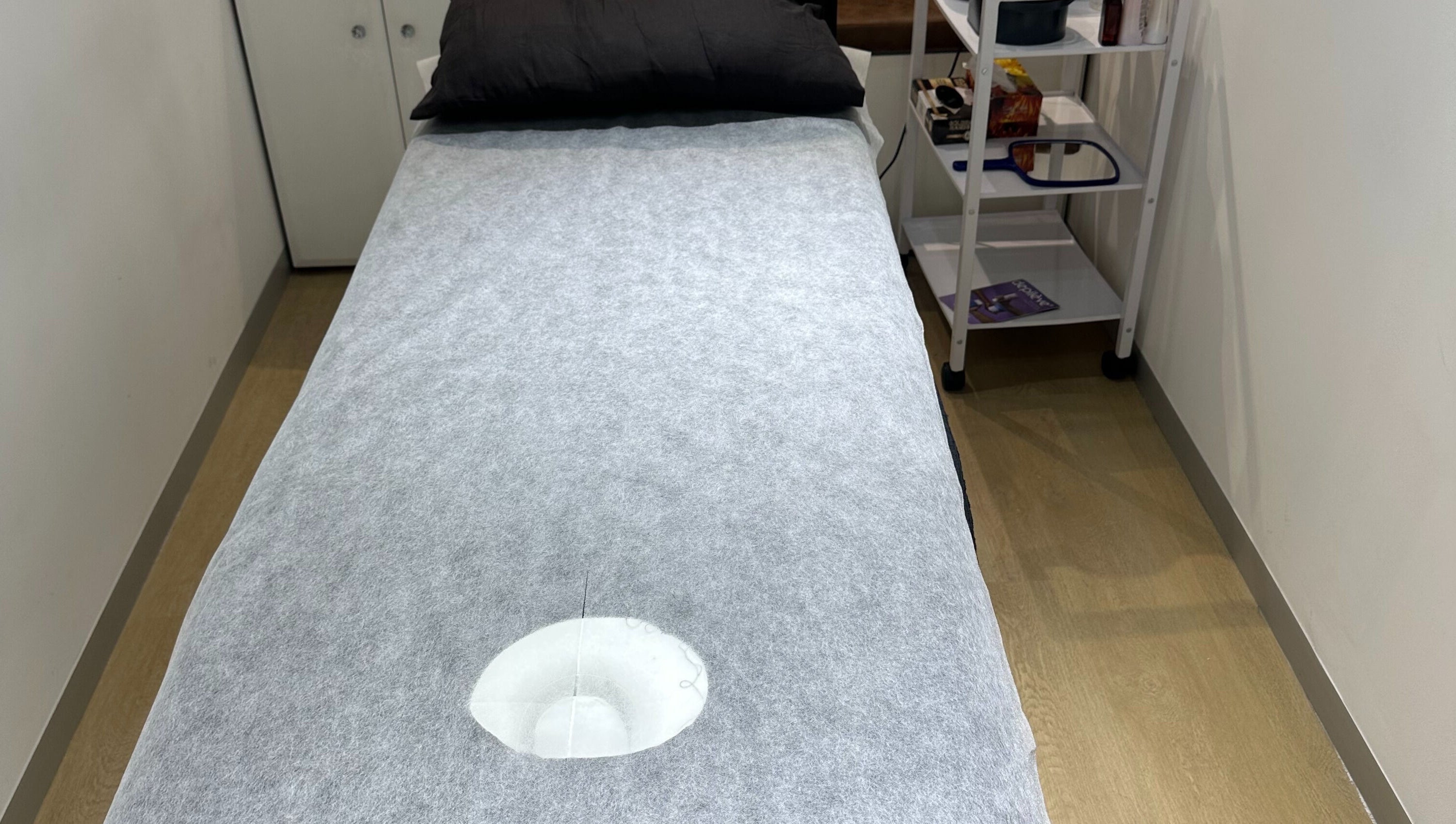 Treatment bed at Wax On Wax Off, Cape Town, Western Cape, ZA, inviting relaxation.