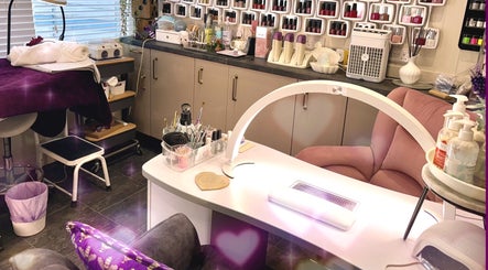 Elegant nail care station at Maddie's Nail & Beauty Studio, Calne, England, GB, showcasing beauty products.